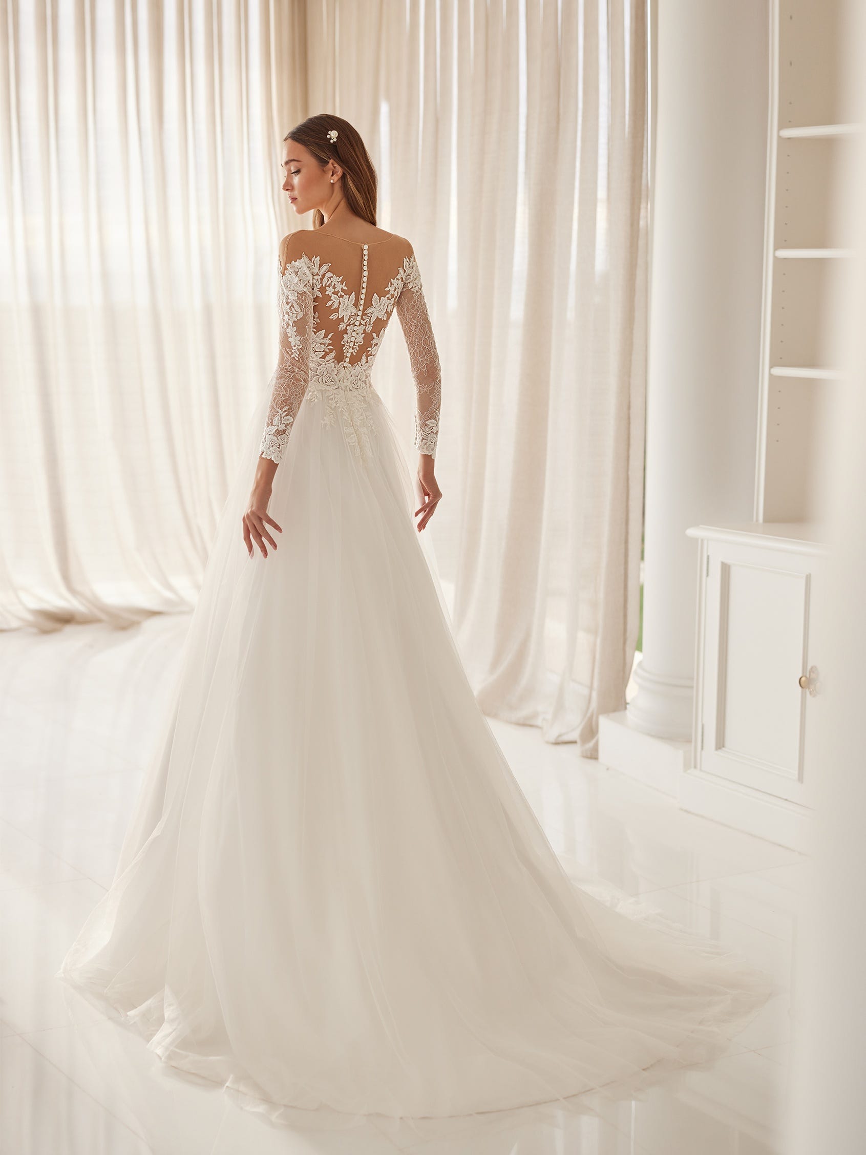 Abiti da sposa sales maniche lunghe 2019